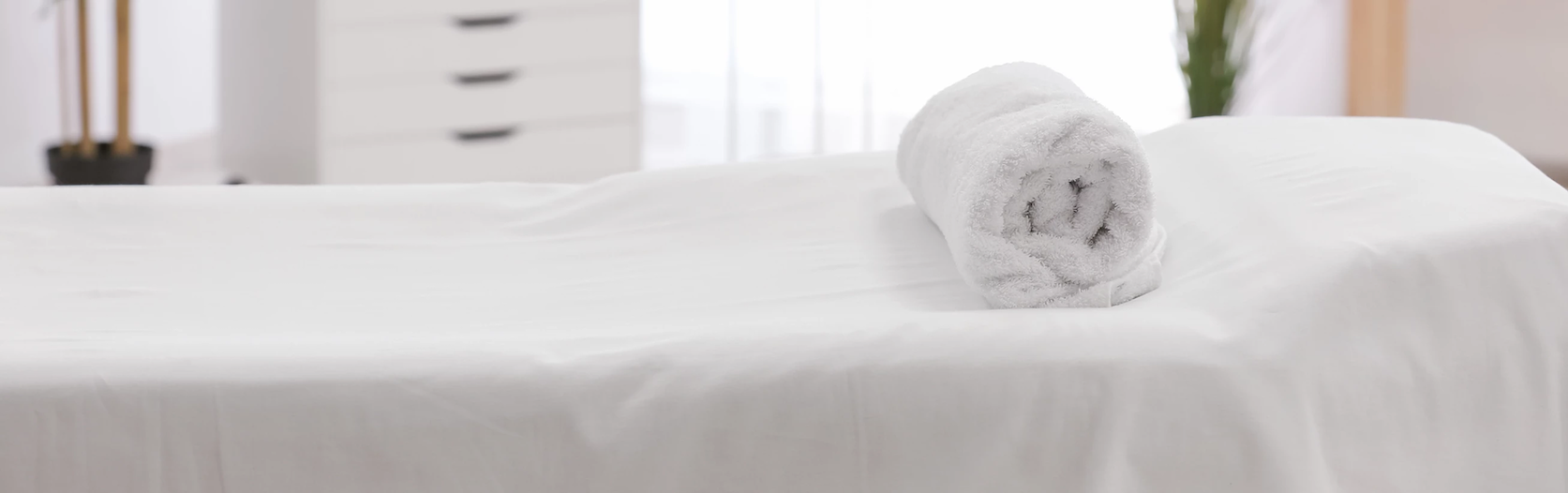 massage table with rolled towel